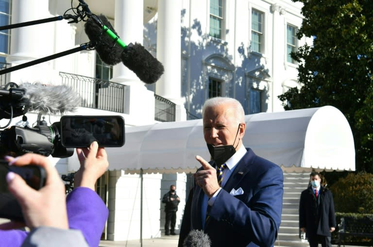 President Joe Biden said US democracy faces a 'defining' moment as he left the White House for Georgia (AFP/Nicholas Kamm)