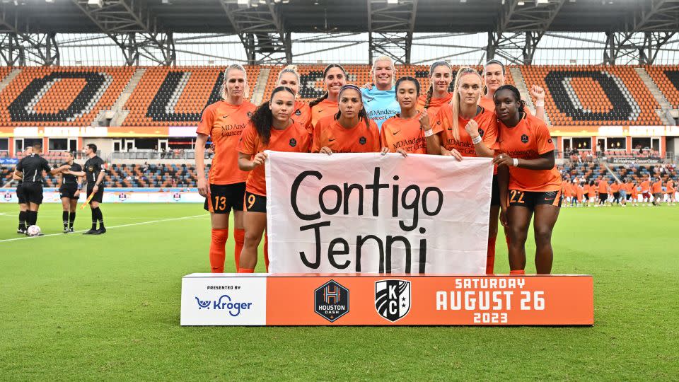 The starting eleven for Houston Dash hold a sign in support of   Hermoso.  - Maria Lysaker/USA Today Sports/Reuters