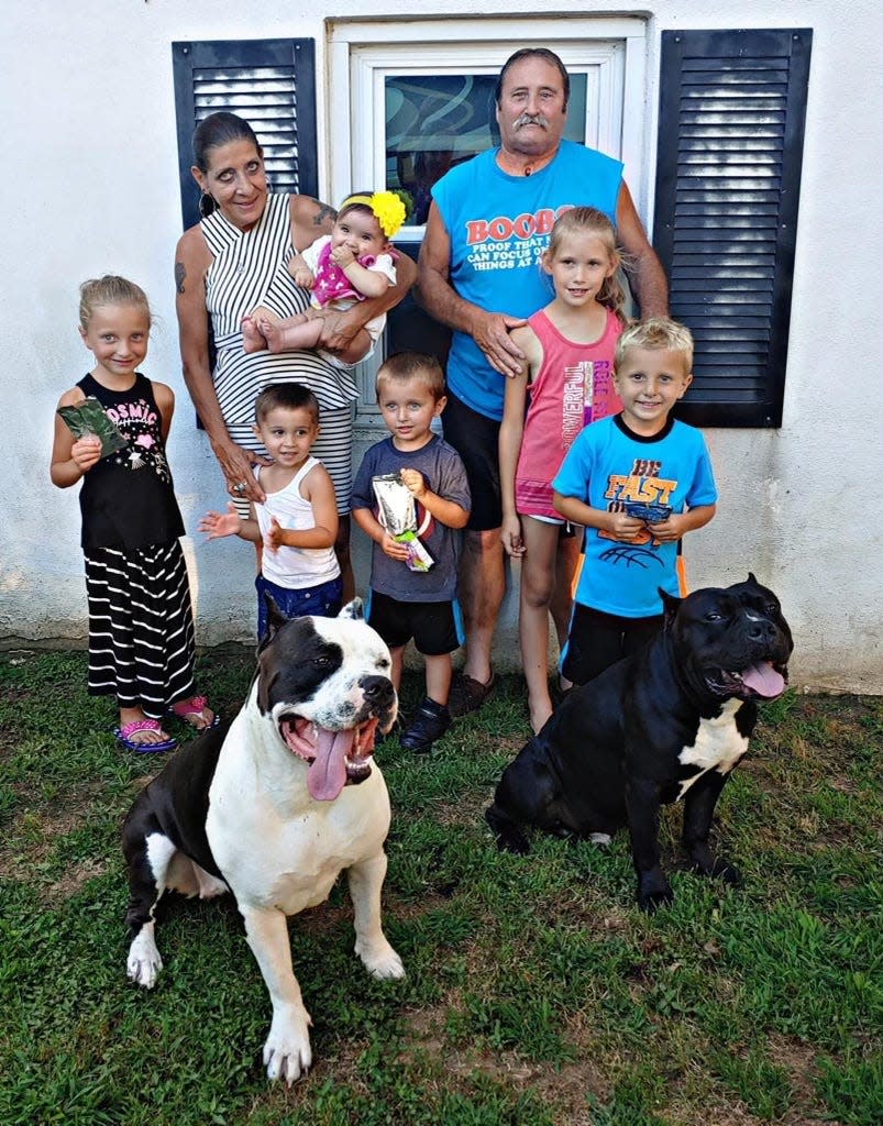 John Dugan, of Bristol Township's Croydon section, pictured with his grandchildren. Dugan was killed when he was struck by a vehicle in the township on Christmas Eve.