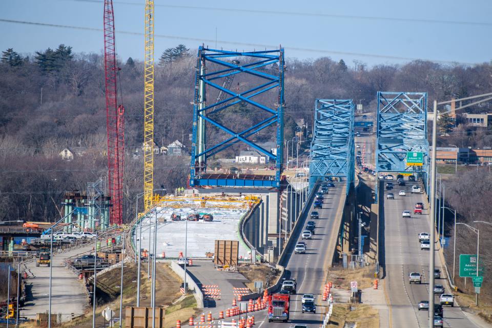 The suspension arch for the new eastbound span of the McClugage Bridge rests on its piers after being floated into place early Tuesday, Dec. 19, 2023 over the Illinois River between Peoria and East Peoria.