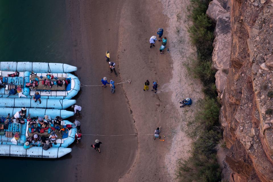 A Wilderness River Adventures group breaks for lunch on the Colorado River below Navajo Bridge on May 25, 2022.