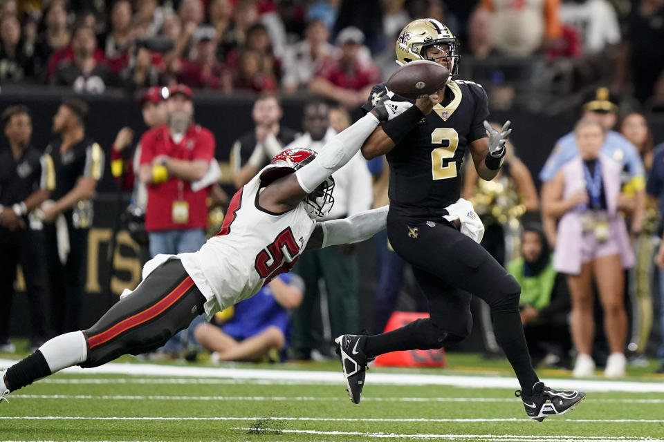 Tampa Bay Buccaneers linebacker Shaquil Barrett strips the ball form New Orleans Saints quarterback Jameis Winston during the first half of an NFL football game in New Orleans, Sunday, Sept. 18, 2022. The Saints recovered the ball. (AP Photo/Gerald Herbert)