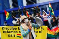 Demonstrators participate in a protest in La Paz