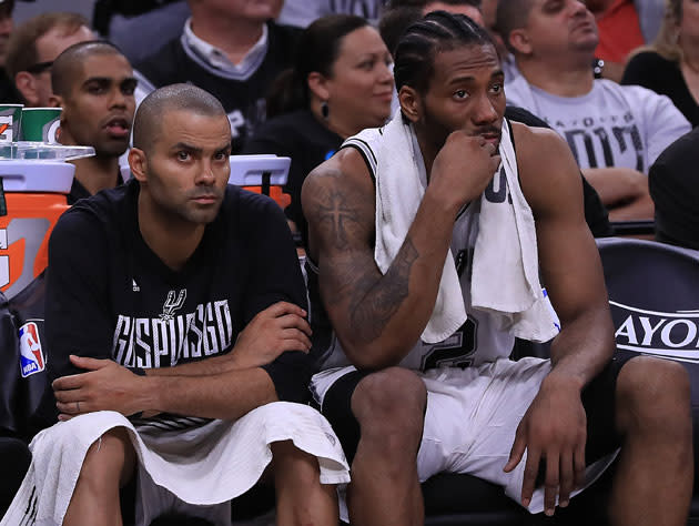 Tony Parker and Kawhi Leonard. (Getty Images)