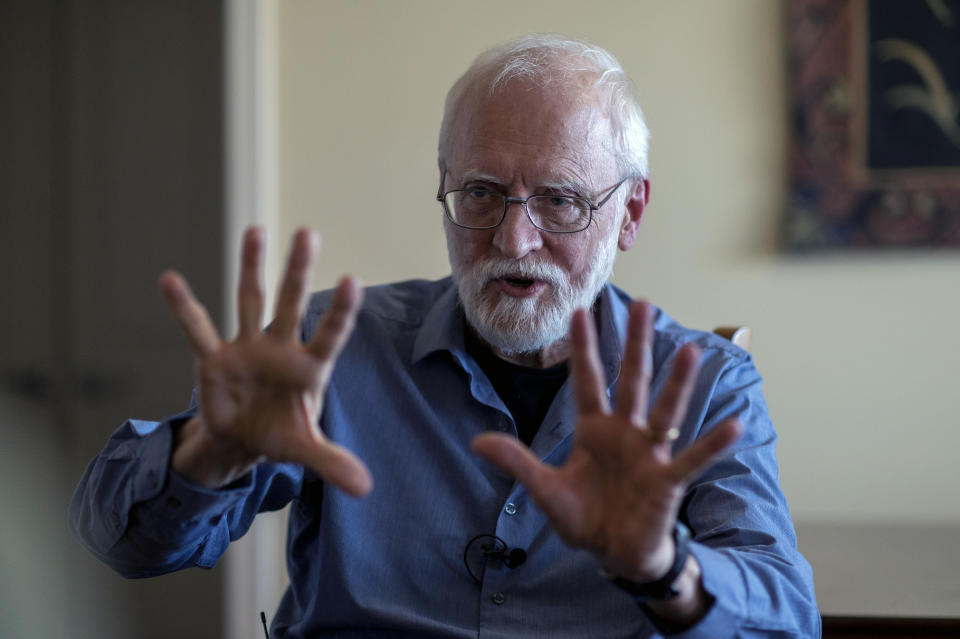 Jim Carpenter gives an interview in the dining room of his home in Frederick, Md., Tuesday, Jan. 19, 2021, the day before the presidential inauguration. Carpenter is a 73-year-old retired statistician who believes what dozens of courts have found: Biden is the rightful winner. (AP Photo/Cliff Owen)