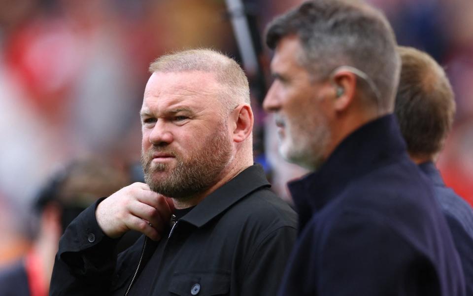 Wayne Rooney and Roy Keane