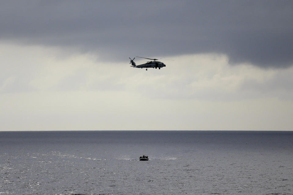 A U.S. Navy helicopter is seen during a training exercise. On Monday, a UH-1N helicopter (not pictured) was shot at while flying over Virginia, authorities said. (Photo: ASSOCIATED PRESS)