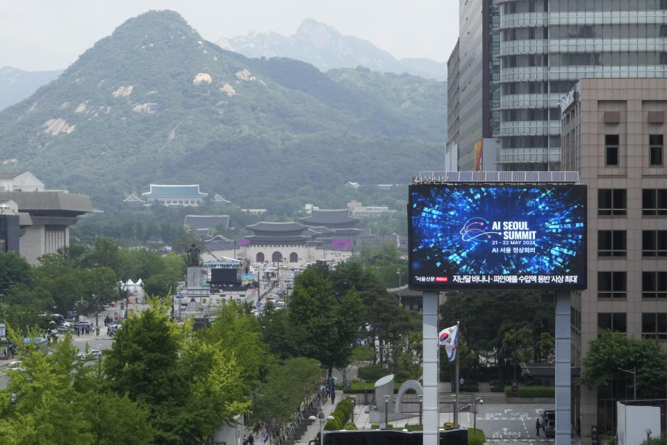 A screen shows an announcement of the AI Seoul Summit in Seoul, South Korea, Tuesday, May 21, 2024. World leaders are expected to adopt a new agreement on artificial intelligence when they gather virtually Tuesday to discuss AI’s potential risks but also ways to promote its benefits and innovation. (AP Photo/Ahn Young-joon)