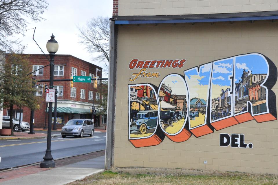 The postcard-style mural on Loockerman Street welcomes people to downtown Dover.