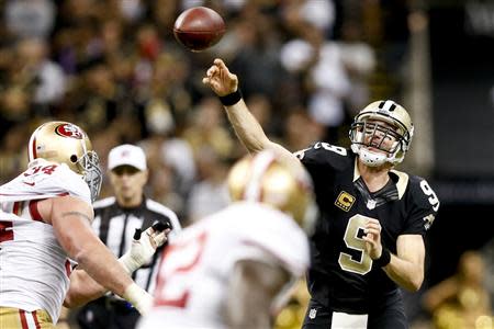 Nov 17, 2013; New Orleans, LA, USA; New Orleans Saints quarterback Drew Brees (9) throws against the San Francisco 49ers during the fourth quarter of a game at Mercedes-Benz Superdome. The Saints defeated the 49ers 23-20. Mandatory Credit: Derick E. Hingle-USA TODAY Sports