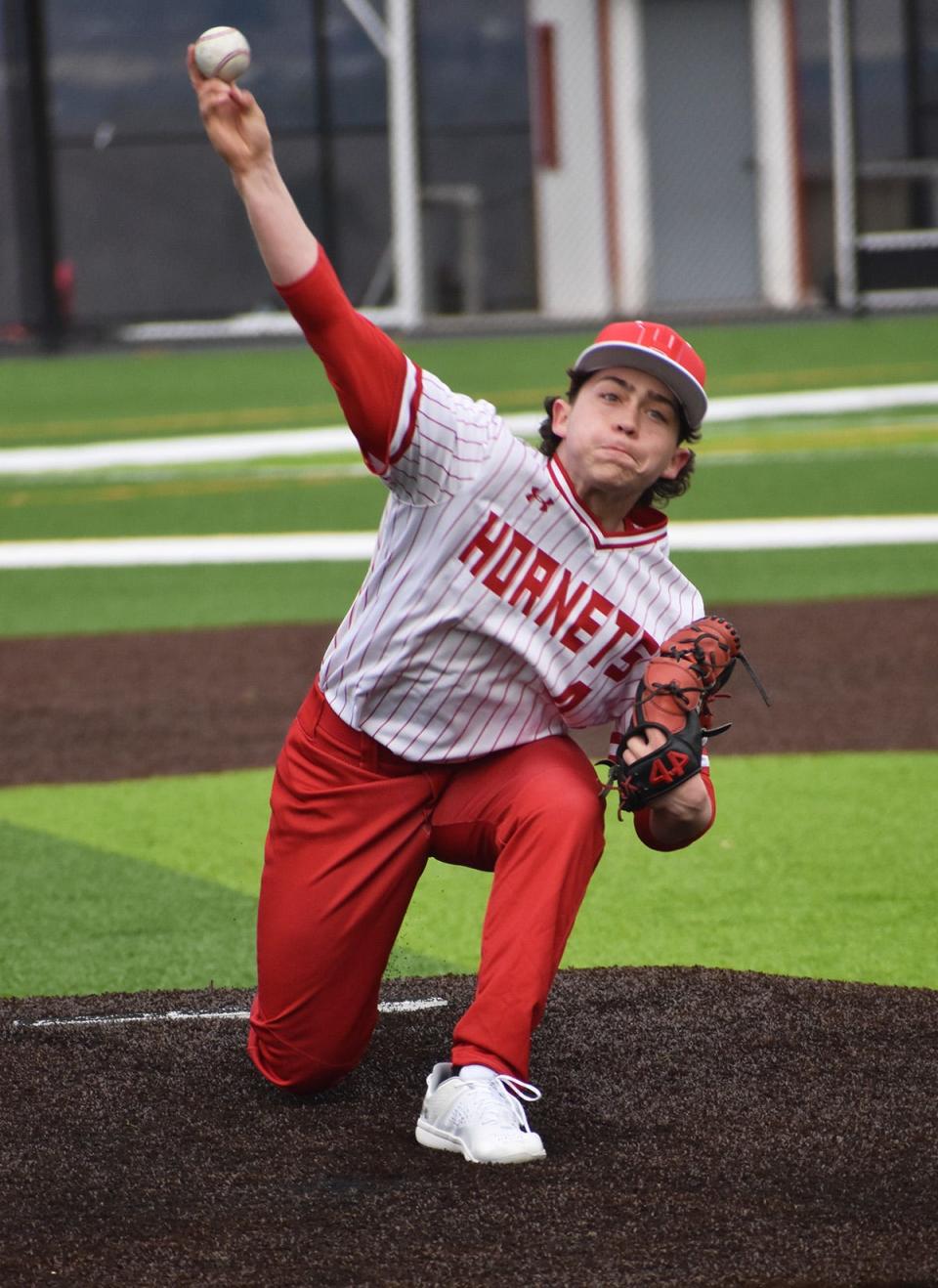 Honesdale sophomore Brody Patrisso deals to the dish during early season varsity baseball action versus Crestwood.