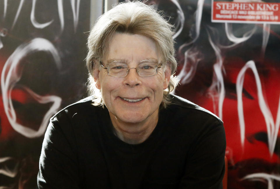 FILE - In this Nov. 13, 2013 file photo, author Stephen King poses for the cameras, during a promotional tour in Paris. Readers may know him best for “Carrie,” “The Shining” and other bestsellers commonly identified as “horror,” but King has long had an affinity for other kinds of narratives, from science fiction and prison drama to the Boston Red Sox. (AP Photo/Francois Mori, File)