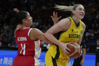 Australia's Lauren Jackson, right, attempts to get past Canada's Natalie Achonwa during their bronze medal game at the women's Basketball World Cup in Sydney, Australia, Saturday, Oct. 1, 2022. (AP Photo/Mark Baker)