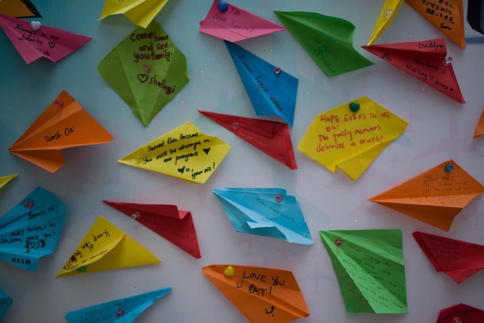 Messages from loved ones to unaccounted for family members are seen on display during a memorial event ahead of the fifth anniversary of the missing Malaysia Airlines flight MH370, in Kuala Lumpur on March 3, 2019. - The Malaysia Airlines jet vanished on March 8, 2014 while en route from Kuala Lumpur to Beijing with 239 people onboard, most of them from China. (Photo by Mohd RASFAN / AFP)        (Photo credit should read MOHD RASFAN/AFP/Getty Images)