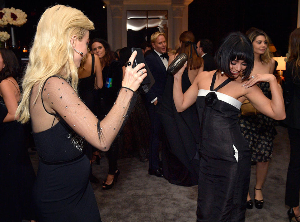 <p>Dance off! Julianne Hough and Vanessa Hudgens busted a move at the InStyle and Warner Bros. party. (Photo: Matt Winkelmeyer/Getty Images for InStyle) </p>