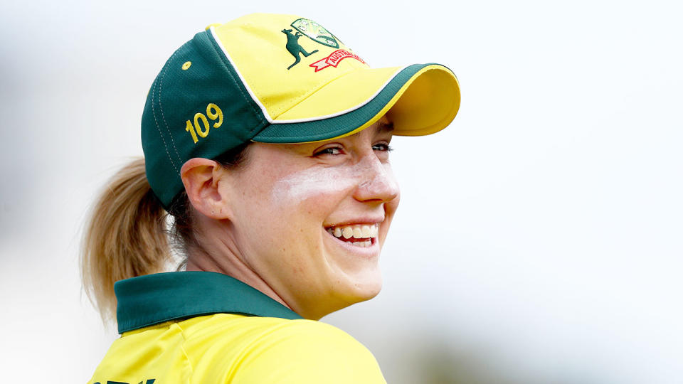 Pictured here, Australian women's cricket star Ellyse Perry smiles during an international match.