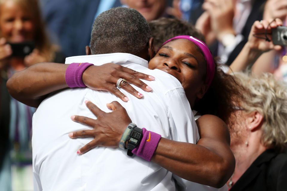 Serena Williams (R) of the USA celebrates with her father Richard Williams after her Ladies Singles final match against Agnieszka Radwanska of Poland on day twelve of the Wimbledon Lawn Tennis Championships at the All England Lawn Tennis and Croquet Club on July 7, 2012 in London, England. (Photo by Clive Rose/Getty Images)