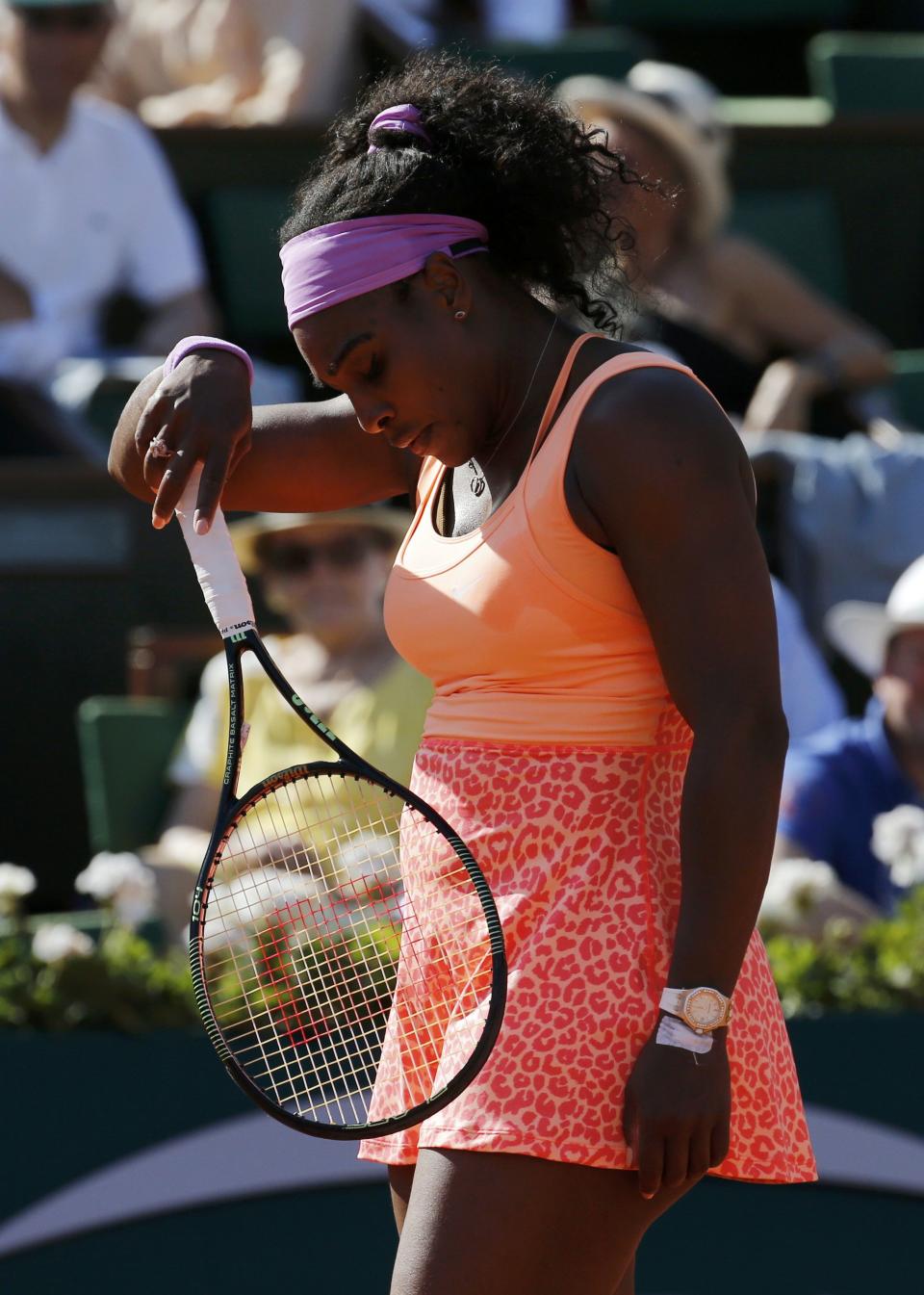 Serena Williams of the U.S. reacts during her women's semi-final match against Timea Bacsinszky of Switzerland at the French Open tennis tournament at the Roland Garros stadium in Paris, France, June 4, 2015. REUTERS/Pascal Rossignol