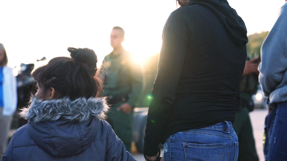 A group of migrants are apprehended by Border Patrol shortly before sunrise in Nogales, Ariz. (NBC)