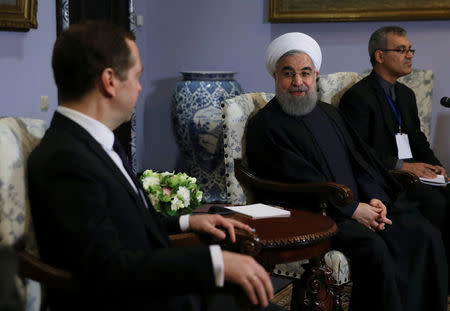 Russian Prime Minister Dmitry Medvedev meets with Iranian President Hassan Rouhani at the Gorki state residence outside Moscow, Russia March 27, 2017. Sputnik/Pool/Ekaterina Shtukina via REUTERS