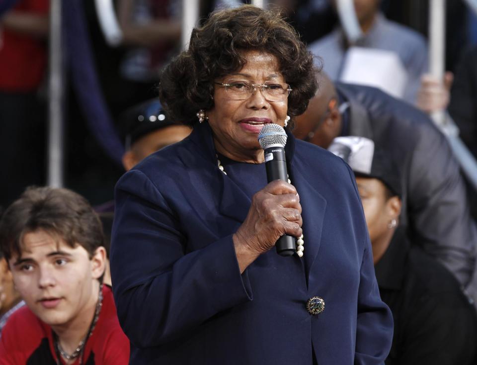 FILE - In this Jan. 26, 2012 file photo, Katherine Jackson speaks during a hand and footprint ceremony honoring her son, musician Michael Jackson, while Prince Michael Jackson, left, listens, in front of Grauman's Chinese Theatre in Los Angeles. Direct questioning of potential jurors will begin on Monday April 15, 2013 in Katherine Jackson’s civil trial against concert giant AEG Live. Dozens of potential jurors will be asked about their responses to a lengthy written questionnaire assessing their knowledge of Michael Jackson’s life, death and whether they can sit on a case in which plaintiff’s attorneys may ask for billions of dollars in damages. (AP Photo/Matt Sayles, File)