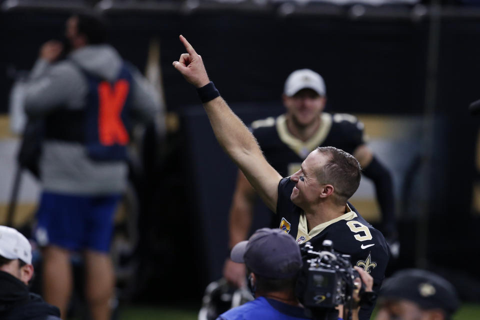 New Orleans Saints quarterback Drew Brees reacts after defeating the Los Angeles Chargers in overtime of an NFL football game in New Orleans, Monday, Oct. 12, 2020. The Saints won 30-27. (AP Photo/Butch Dill)