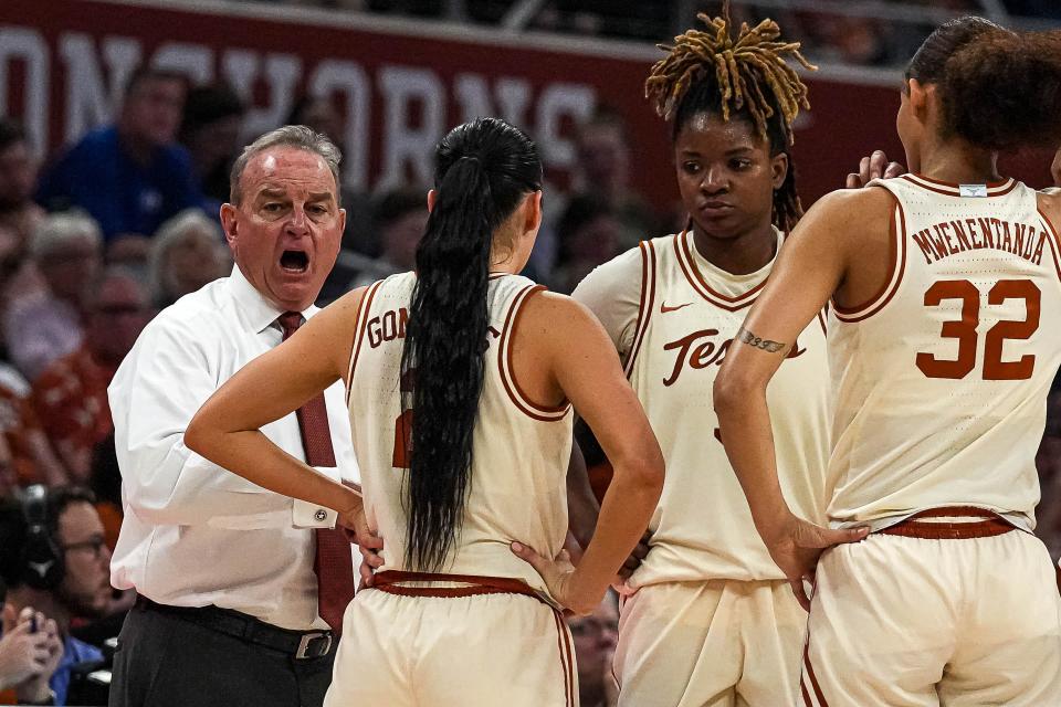 Texas head coach Vic Schaefer talks to his team during a break in play of their March 2 win over BYU at Moody Center. "Vic's one of the greatest coaches of all time," said Schaefer's boss, Texas athletic director Chris Del Conte. "One of the top five women's coaches of all time for me."