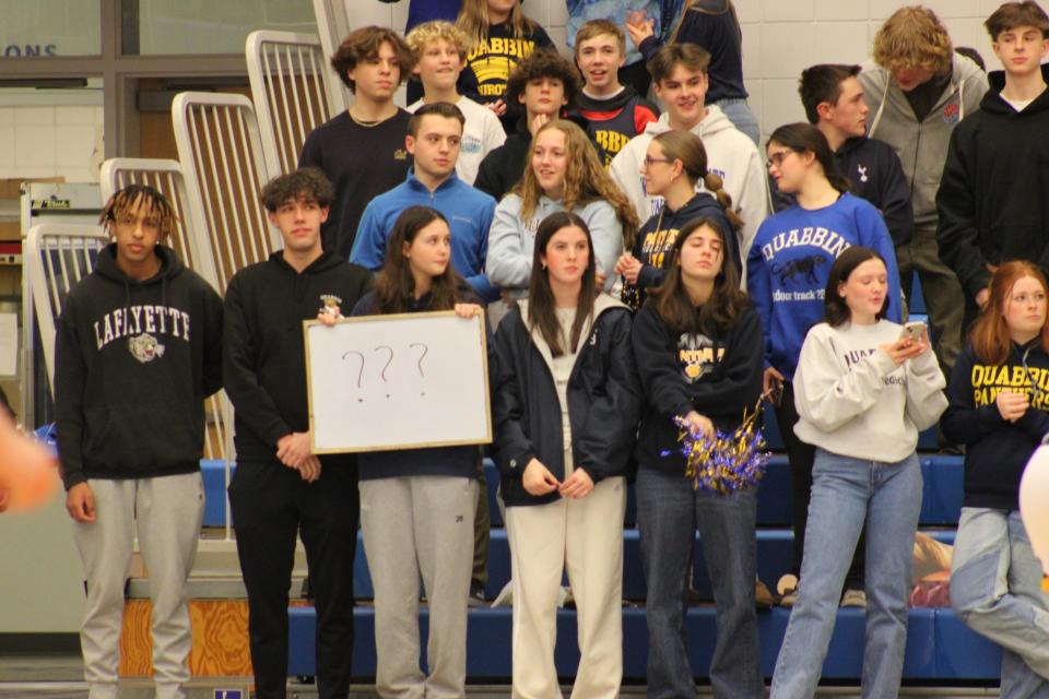 The Quabbin fan section showed out for the Panthers at the Class B Central Mass. final at Worcester State on Feb. 21, 2024. Always present with the fans is their white board that they update throughout the game.