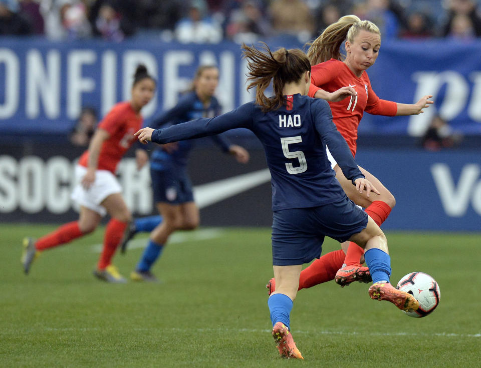 United States defender Kelley O'Hara (5) plays against England forward Toni Duggan (11) during the first half of a SheBelieves Cup women's soccer match Saturday, March 2, 2019, in Nashville, Tenn. O'Hara honors Heather O'Reilly "HAO" by wearing her name on the back of her jersey. (AP Photo/Mark Zaleski)