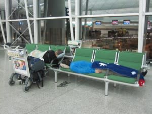 Sleeping on airport benches