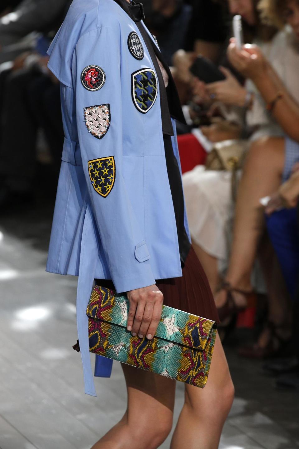 A model presents a creation as part of Christian Dior's ready-to-wear Spring/Summer 2014 fashion collection, presented Friday, Sept. 27, 2013 in Paris. (AP Photo/Christophe Ena)