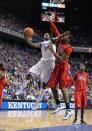 LEXINGTON, KY - FEBRUARY 18: Michael Kidd-Gilchrist #14 of the Kentucky Wildcats shoots the ball while defended by Aaron Jones #34 of the Ole Miss Rebels during the game at Rupp Arena on February 18, 2012 in Lexington, Kentucky. (Photo by Andy Lyons/Getty Images)