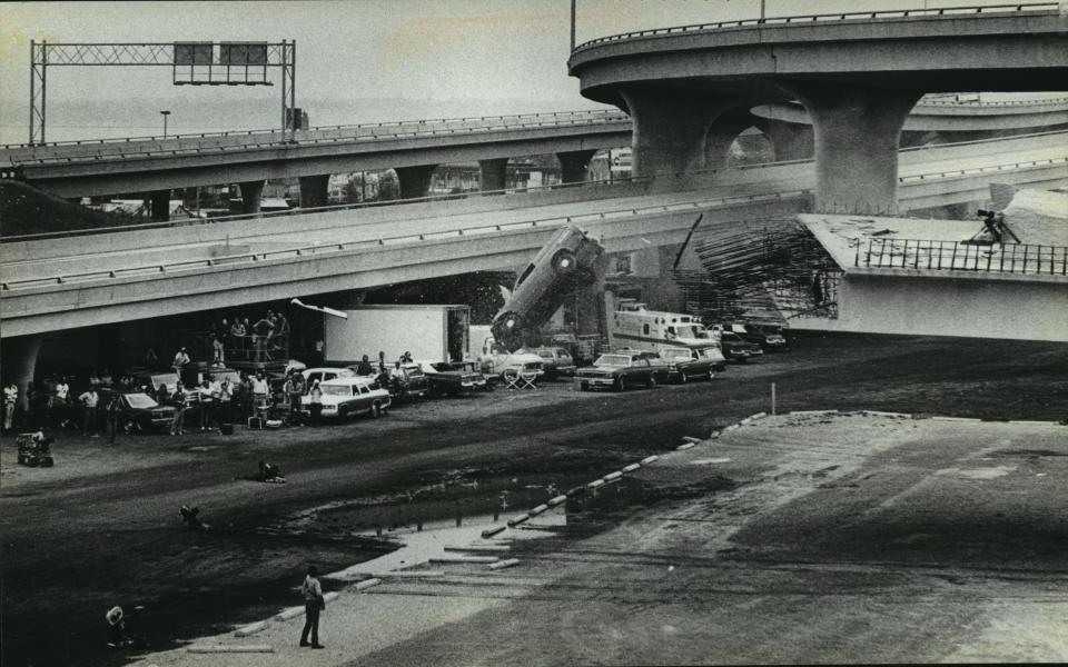 A car driven by Illinois Nazis (not really) careens off the stub end of the East-West Freeway during filming for "The Blues Brothers" in Miwlaukee on Aug. 28, 1979.