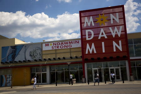 Customers are seen outside the Mondawmin Mall in Baltimore, Maryland May 3, 2015. REUTERS/Eric Thayer