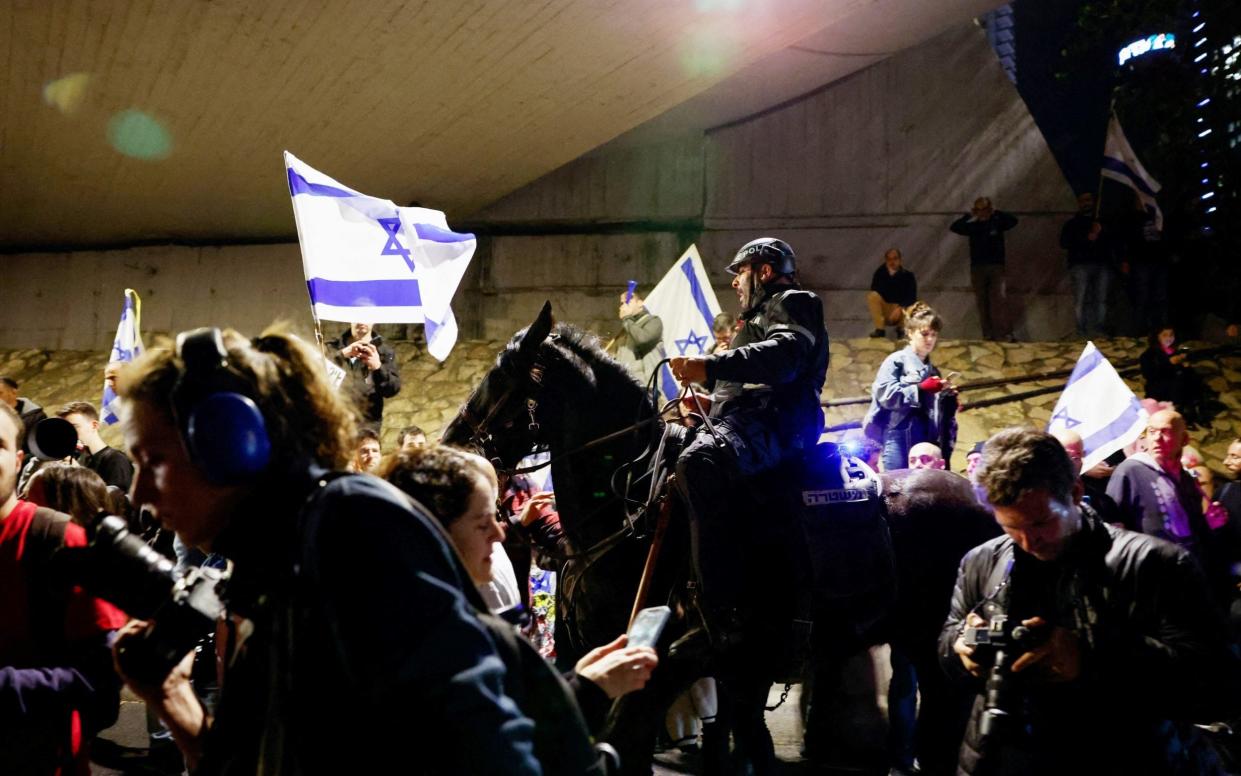 A police officer guards the area