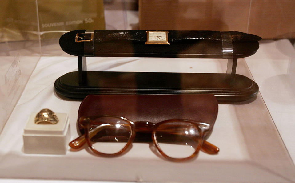 most expensive watches in the world, John F. Kennedy's Omega Ultra Thin Reference OT3980 dress watch., NEW YORK - NOVEMBER 16:  Items belonging to former U.S. President John F. Kennedy, including reading glasses and a Omega watch worn at his inauguration, lie on display at an auction preview at the Trump Tower November 16, 2005 in New York City. Part of the Robert White Collection, the items to be auctioned, which number into the thousands, cover a broad period of the late president's life. The auction will take place on December 13-17 at the 7th Regiment Armory in New York City.  (Photo by Spencer Platt/Getty Images)