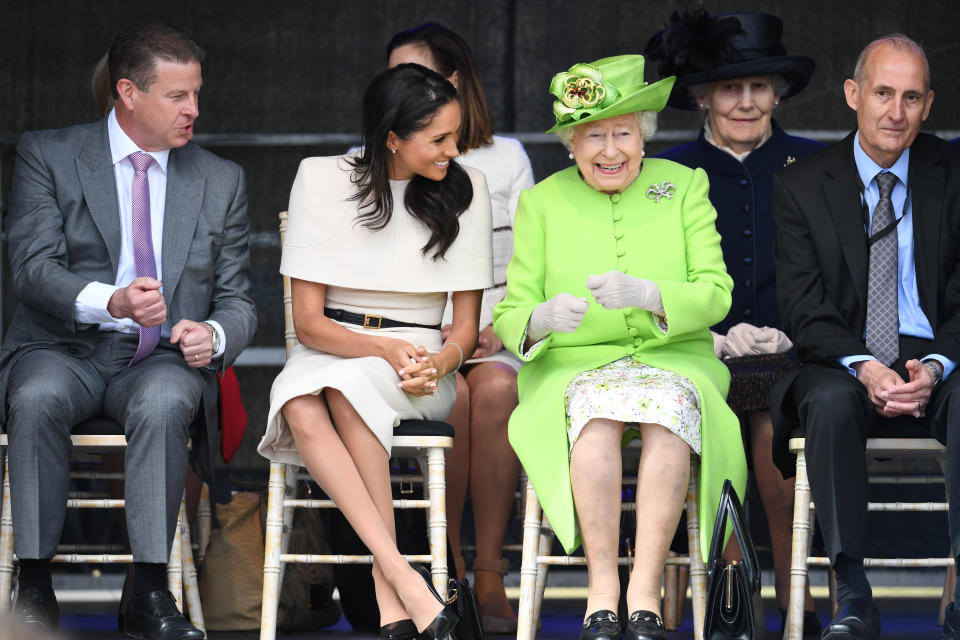 Meghan Markle sharing a joke with the Queen at their first official outing together. [Photo: Getty]