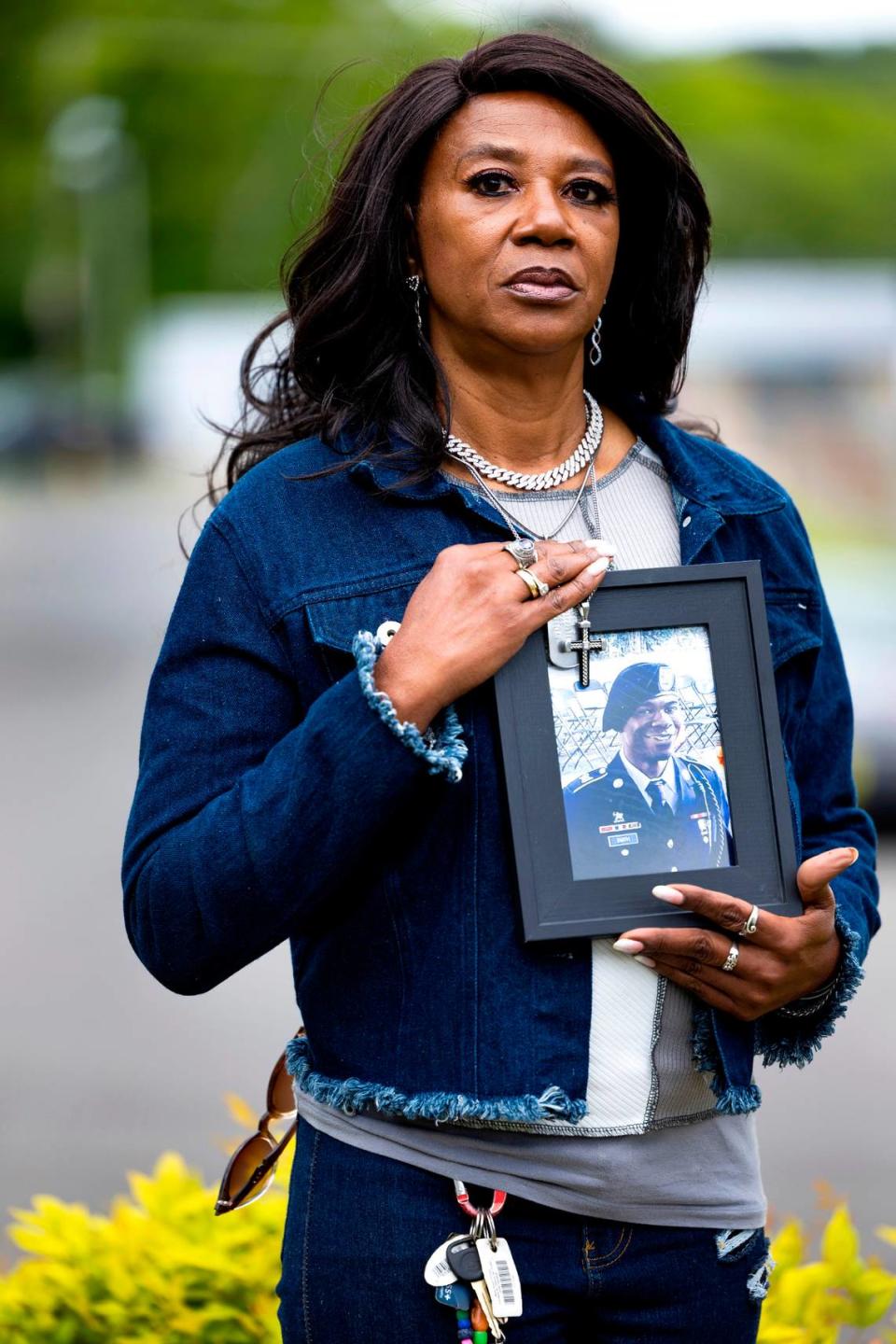 Valerie Smith-Ragland poses with a photo of her son, Makari Jamel Smith, in Oxford, N.C.