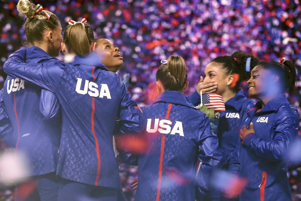 Female U.S. Olympic gymnasts in a scene from "Athlete A."