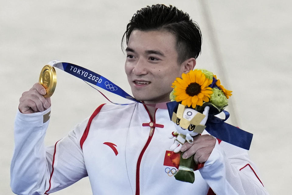 Liu Yang, of China, celebrates after winning the gold medal on the rings during the artistic gymnastics men's apparatus final at the 2020 Summer Olympics, Monday, Aug. 2, 2021, in Tokyo, Japan. (AP Photo/Gregory Bull)