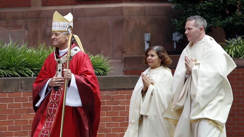 Cardinal Donald Wuerl, then the archbishop of Washington, walks toward the Cathedral of St. Matthew the Apostle before starting the annual Red Mass in Washington on Sunday, Oct. 2, 2011.