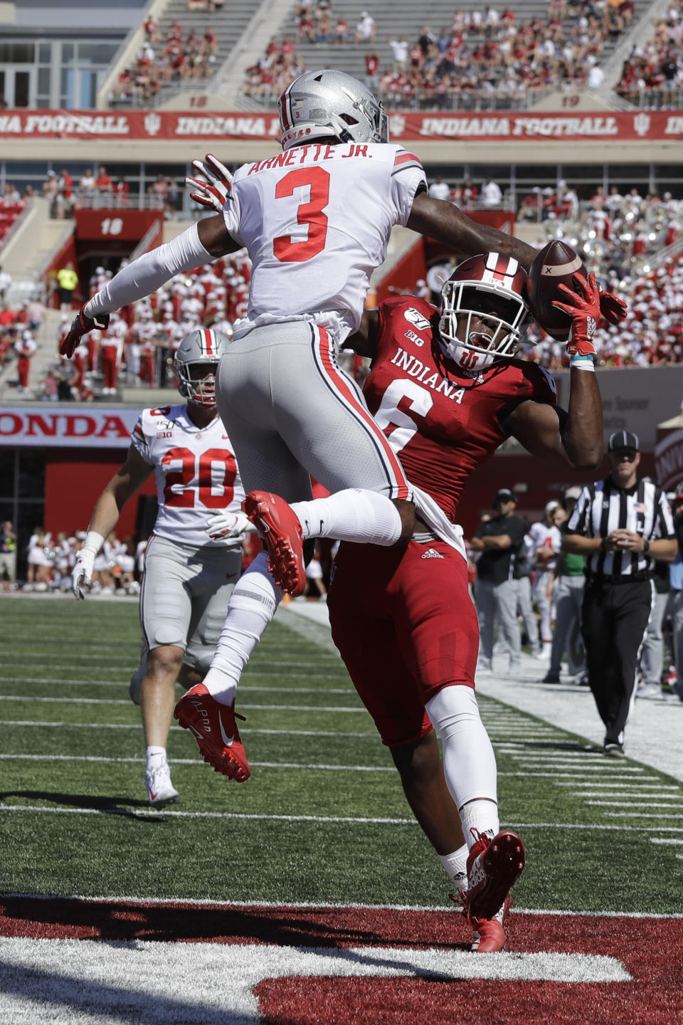 Ohio State cornerback Damon Arnette (3) breaks up a pass intended for Indiana wide receiver Donavan Hale (6) during the first half of an NCAA college football game, Saturday, Sept. 14, 2019, in Bloomington, Ind. (AP Photo/Darron Cummings)