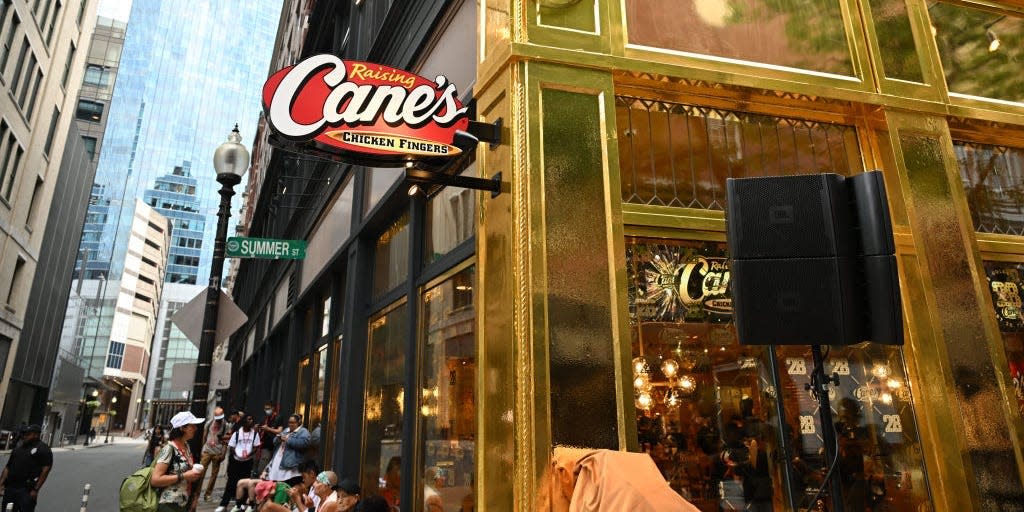 A gold Raising Cane's storefront in Boston.