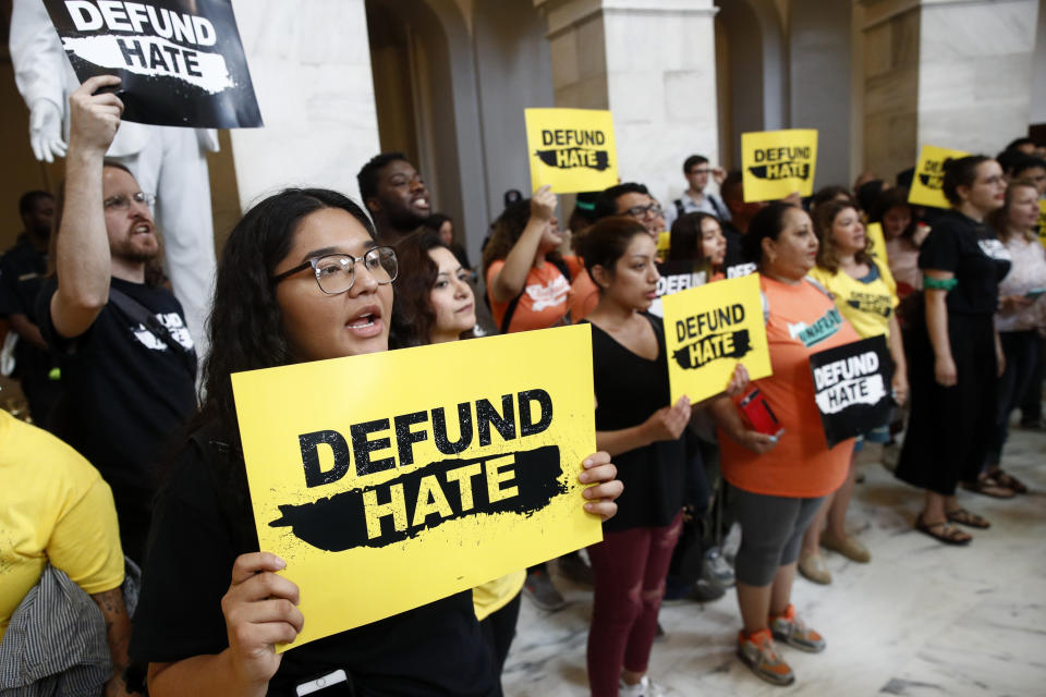 Protesters gather to demand the defunding of government agencies for border protection and customs enforcement, Tuesday, June 25, 2019, on Capitol Hill in Washington. (AP Photo/Patrick Semansky)