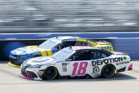 Trevor Bayne (18) and Justin Allgaier (7) come through a turn during a NASCAR Xfinity Series auto race Saturday, June 25, 2022, in Lebanon, Tenn. (AP Photo/Mark Humphrey)