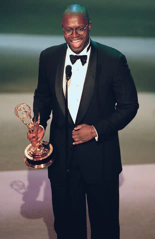 <p>Chris Haston/NBCU Photo Bank/NBCUniversal via Getty</p> Andre Braugher accepting an Emmy Award for outstanding lead actor in a drama series for 'Homicide: Life on the Street' in 1998.