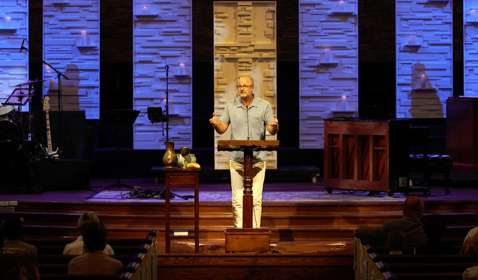 In this Aug. 23, 2020, photo provided by Steve NeSmith, Scott Sauls, senior pastor at Christ Presbyterian Church, preaches to his congregation in Nashville, Tenn. (Steve NeSmith/Christ Presbyterian Church via AP)