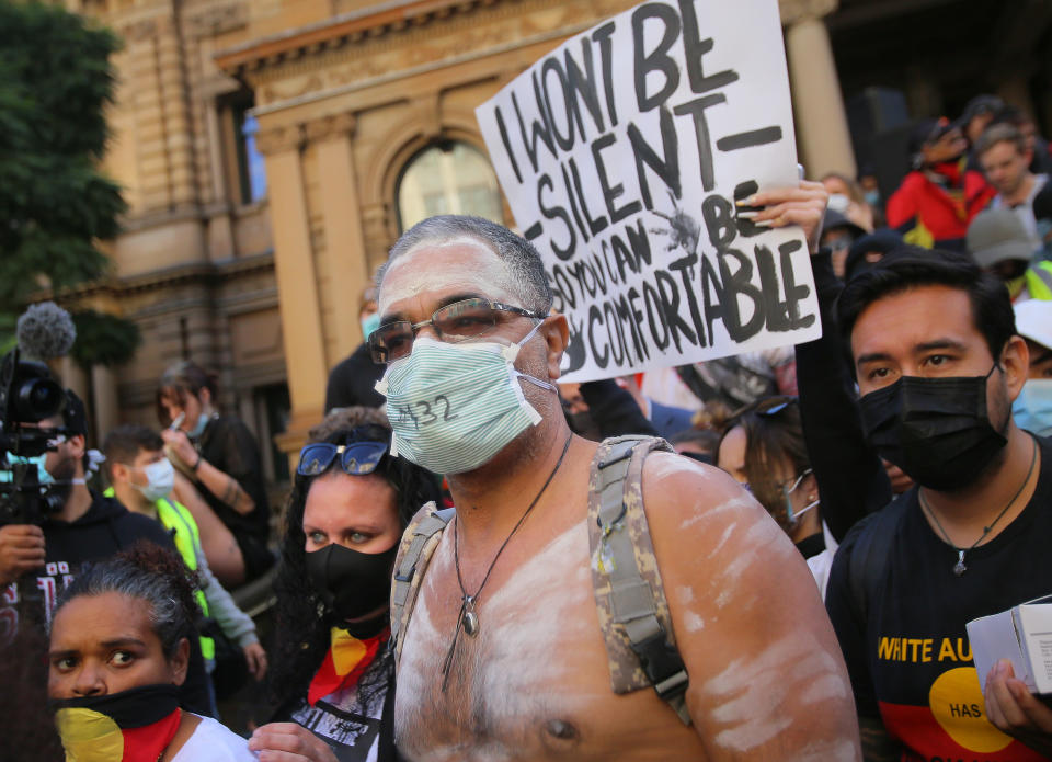 SYDNEY, AUSTRALIA - JUNE 6: Protesters participate in a protest in Sydney to show solidarity with Black Lives Matter demonstrations in the US, which were sparked by the death of George Floyd and rally to stop Aboriginal deaths in custody after an appeal court's last-minute decision to authorise the public gathering in Australia on June 6, 2020. (Photo by Steven Saphore/Anadolu Agency via Getty Images)