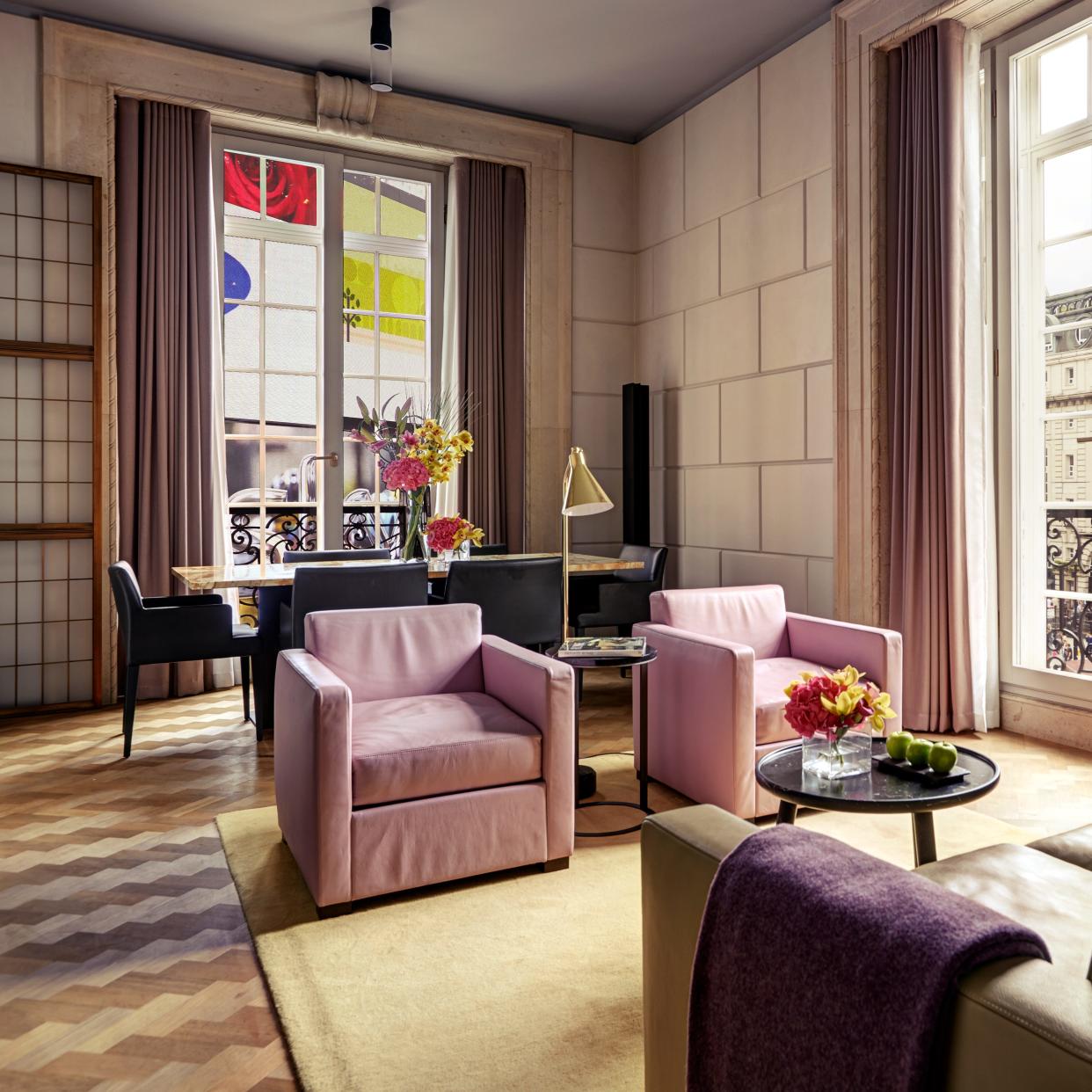 Hotel Café Royal's Regent Suite, with the Piccadilly Circus display shown in the background