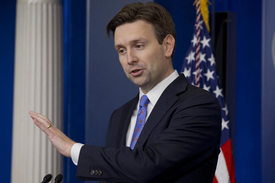 White House deputy press secretary Josh Earnest speaks during the daily news briefing at the White House in Washington, Thursday, Feb. 20, 2014. Earnest answered questions including on the deficit and the situation in Ukraine. (AP Photo/Jacquelyn Martin)